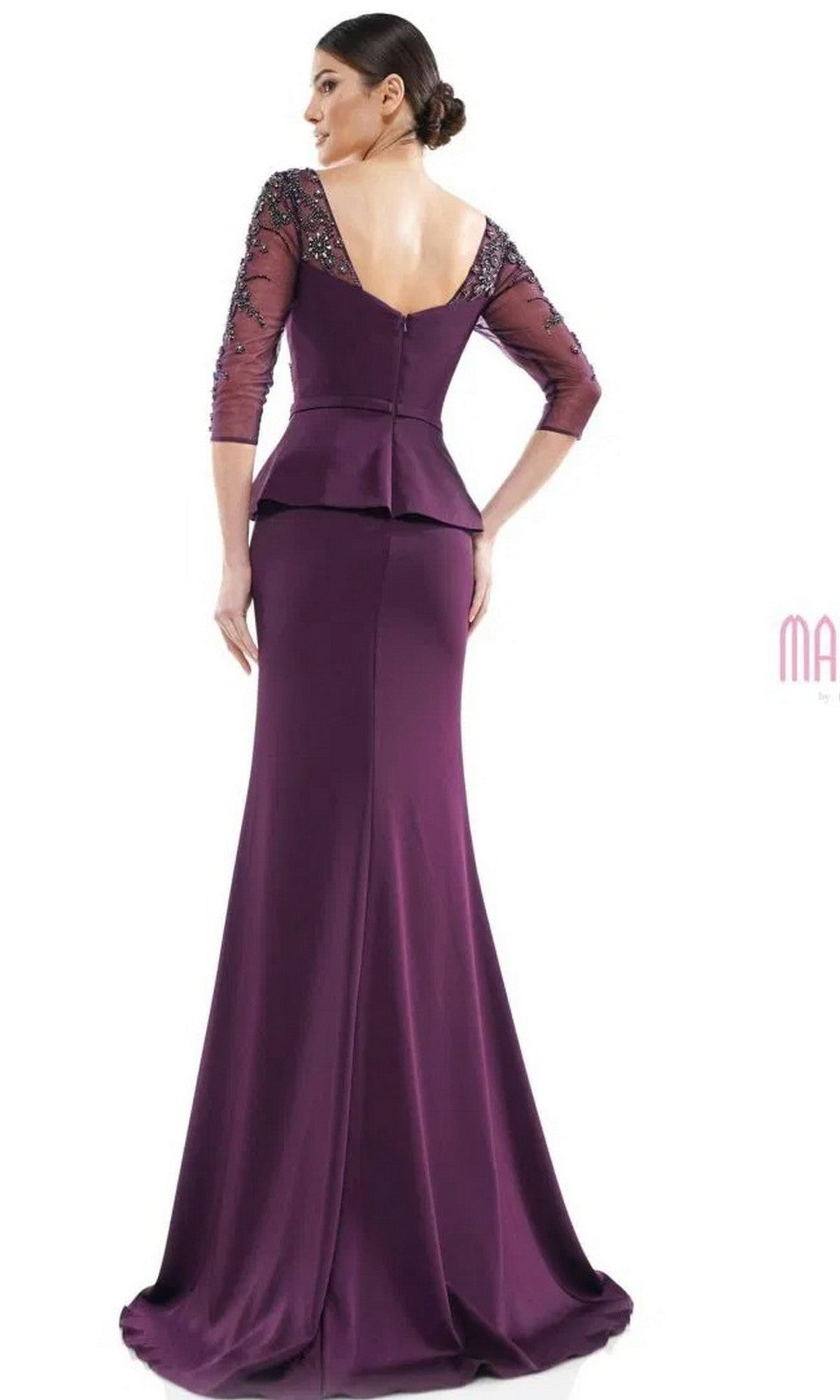 Woman in a long formal dress: The Marsoni MV1037 is a fitted purple gown with sheer, embellished three-quarter sleeves and a peplum waist, shown from the back against a white background.